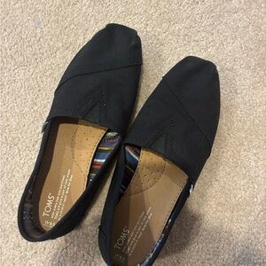 TOMS Classic Black Canvas Slip-Ons